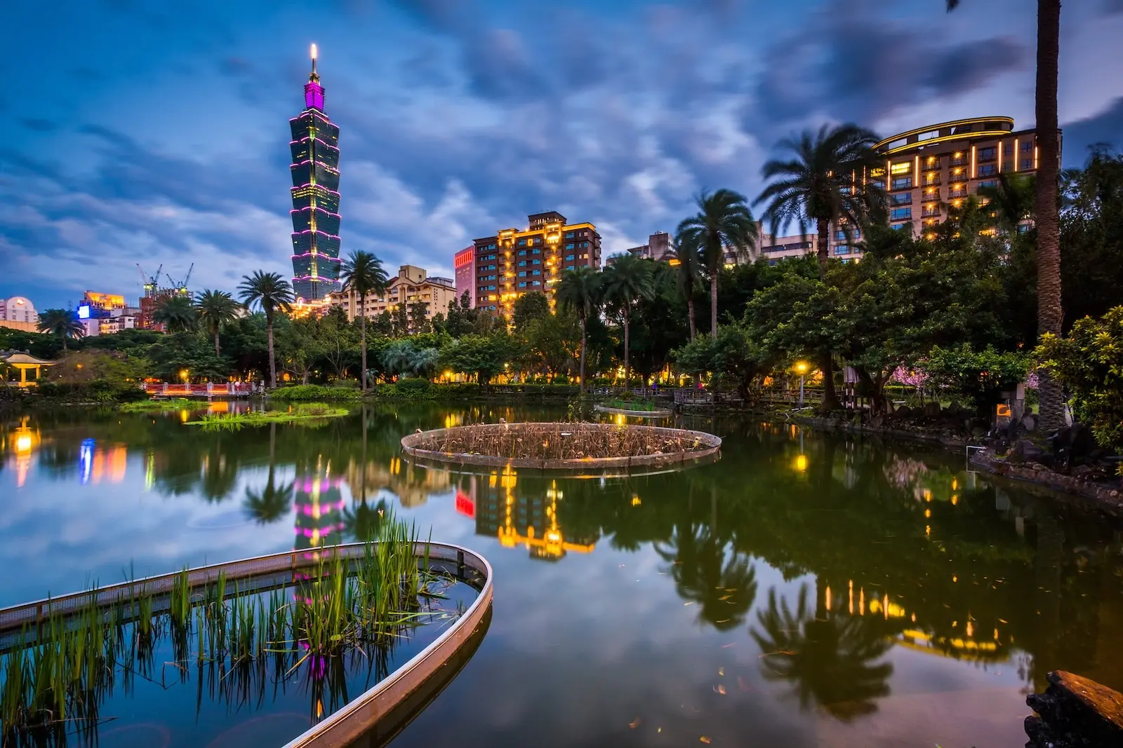 Taipei 101 reflected in the lake at night, viewed from Zhongzheng Park